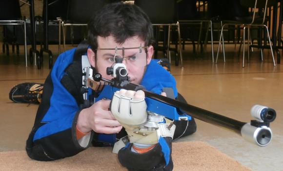 Engineering student Raphaël Chevalier demonstrates shooting in prone position