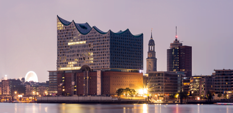 More than 1,000 curved window panels capture and reflect the color of the sky