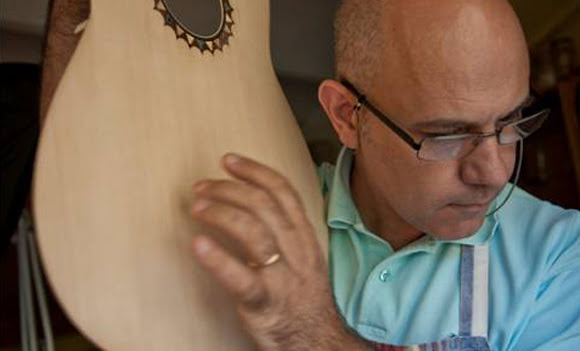 Raquel Benito playing a Manjon guitar from a centuries-old handmade tradition.