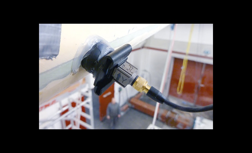  A triaxial accelerometer mounted on the leading edge of a blade.
